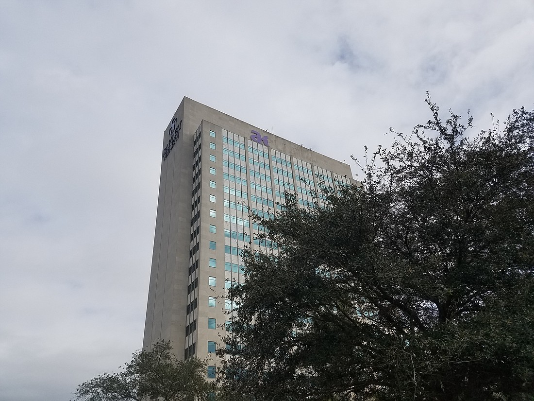 Most of the Aetna sign atop the Eight Forty One Building at 841 Prudential Drive has been removed. All that remained Tuesday was â€œaâ€ and half of an â€œe.â€