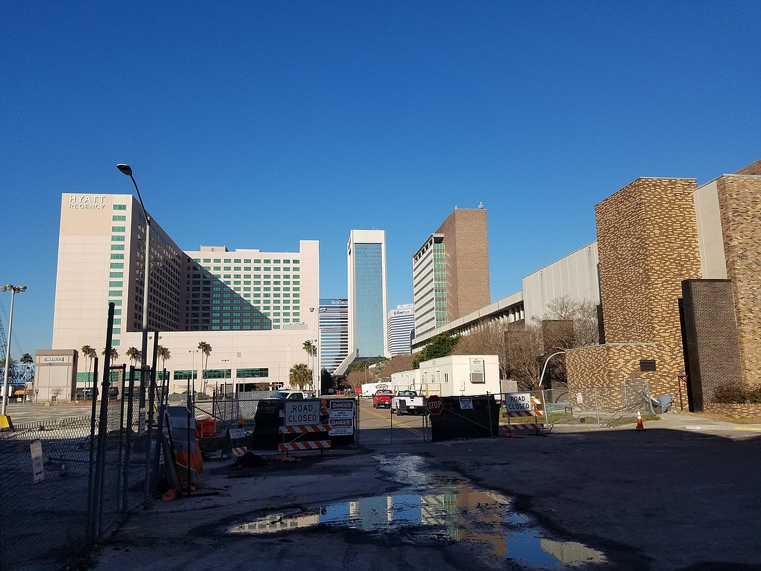 The city plans to tear down the old Duval County Courthouse and City Hall Annex (right). The DIA is seeking proposals to turn the site into a convention center complex.