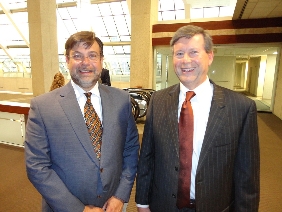 Jacksonville Bar Association President Tad Delegal, left, and attorney Kelly Mathis.