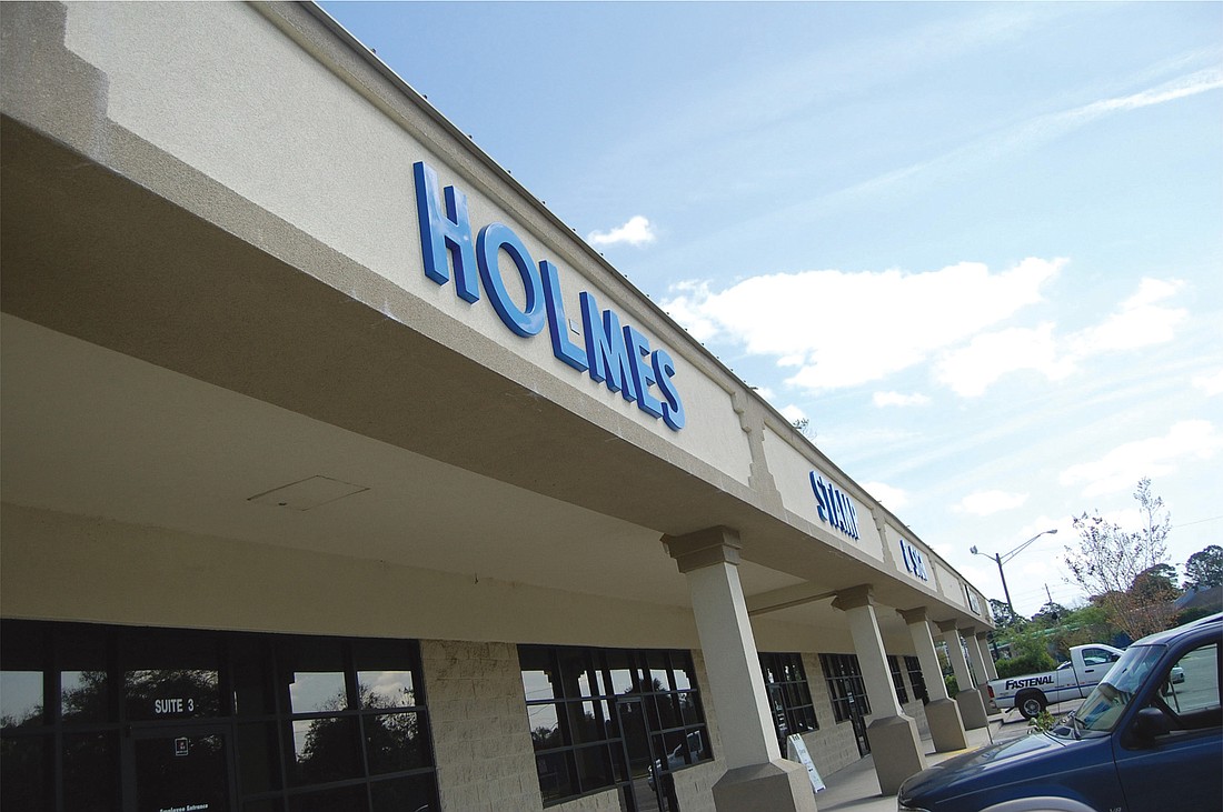 Holmes Custom, based at 2021 St. Augustine Road, bought land nearby for additional space or a potential expanded headquarters.