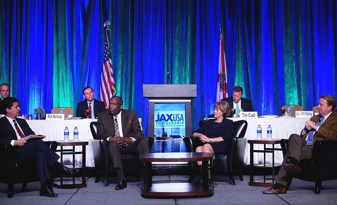 Jacksonville University Public Policy Institute Director Rick Mullaney and Mayor Lenny Curry with local college presidents  Nat Glover, Cynthia Bioteau, Tim Cost  and John Delaney at the JAXUSA Partnership Luncheon on Monday.