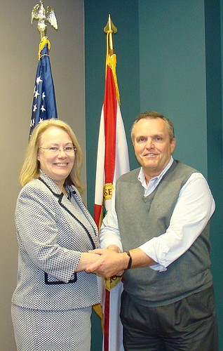 Clay County Chamber of Commerce President Tresa Calfee and Bob Olson, chairman of the chamberâ€™s board of directors and member of the search committee that chose Calfee. Olson is director of the Thrasher-Horne Conference Center.