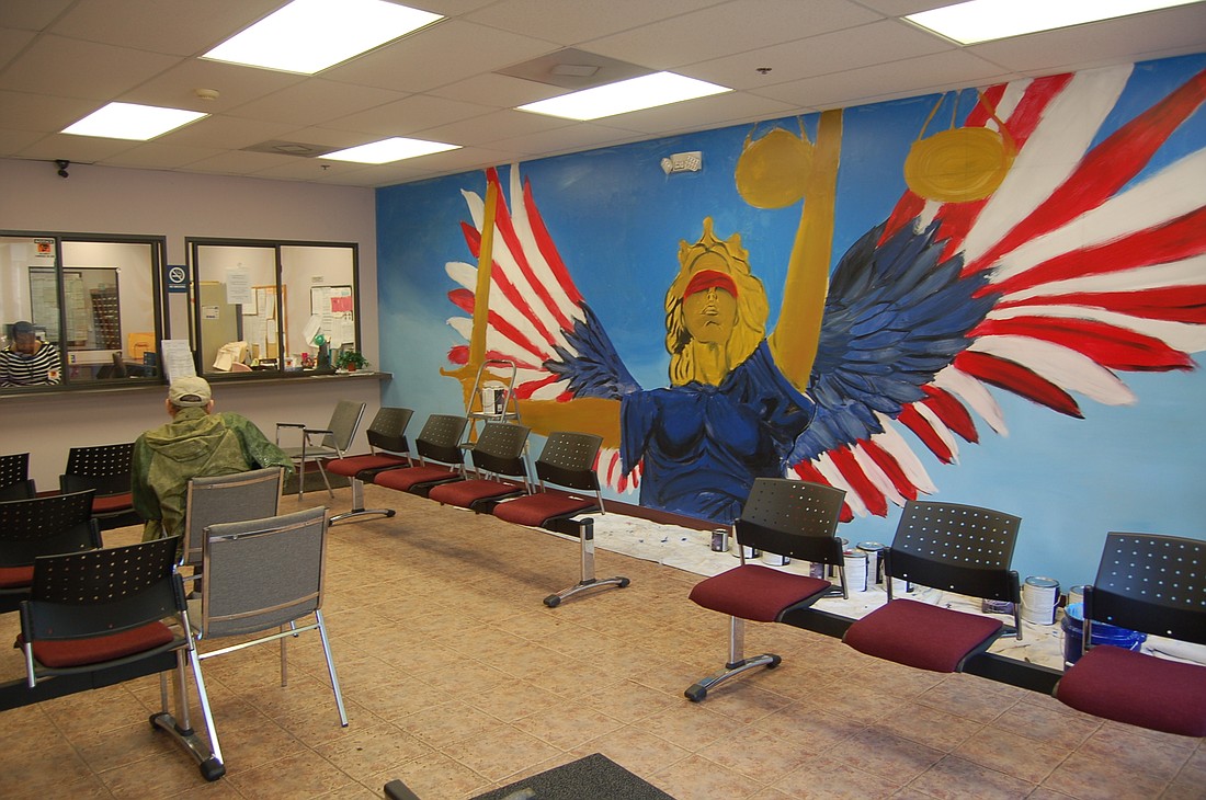 A mural painted by artist Cody Monahan is taking shape at Jacksonville Area Legal Aidâ€™s office at 126 W. Adams St.