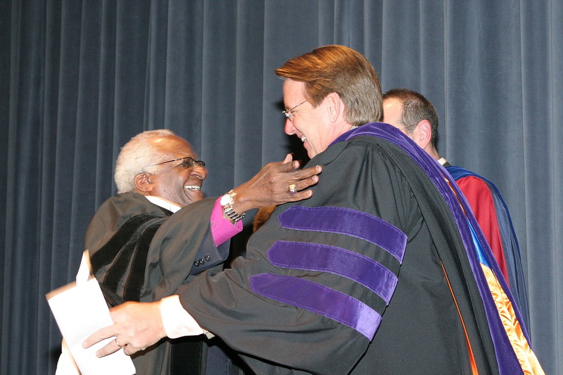 Archbishop Desmond Tutu receives an honorary Doctorate of Humane Letters from University of North Florida President John Delaney on November 12, 2005.