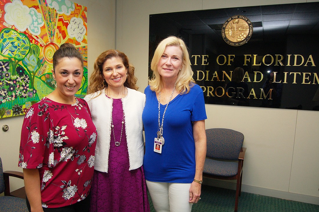 From left, 4th Judicial Circuit Guardian Ad Litem Program Director Vanessa Byerly; Christine Meyer, supervising attorney; and Lauri Dieterle, who has been a volunteer child advocate for nearly 10 years.