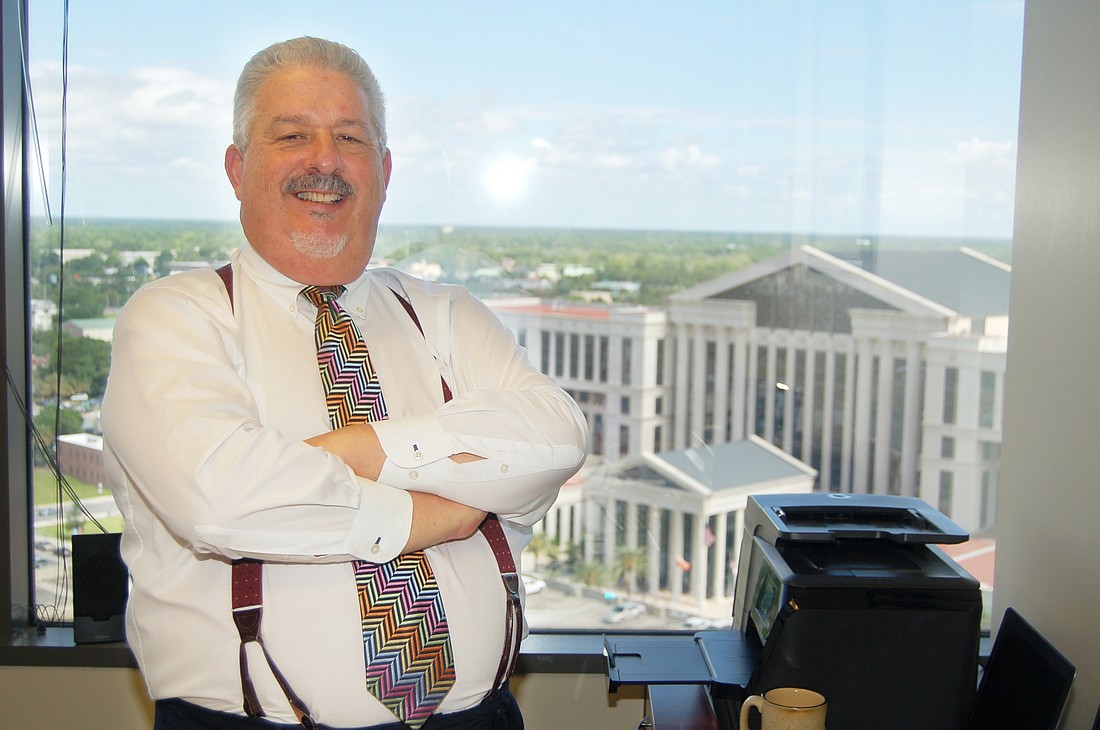 A. Russell Smith moved his law office from Newnan Street near Union Street to TIAA Bank Center at 301 W. Bay St. He said itâ€™s an advantage for him and his clients to be closer to the Duval and federal courthouses.
