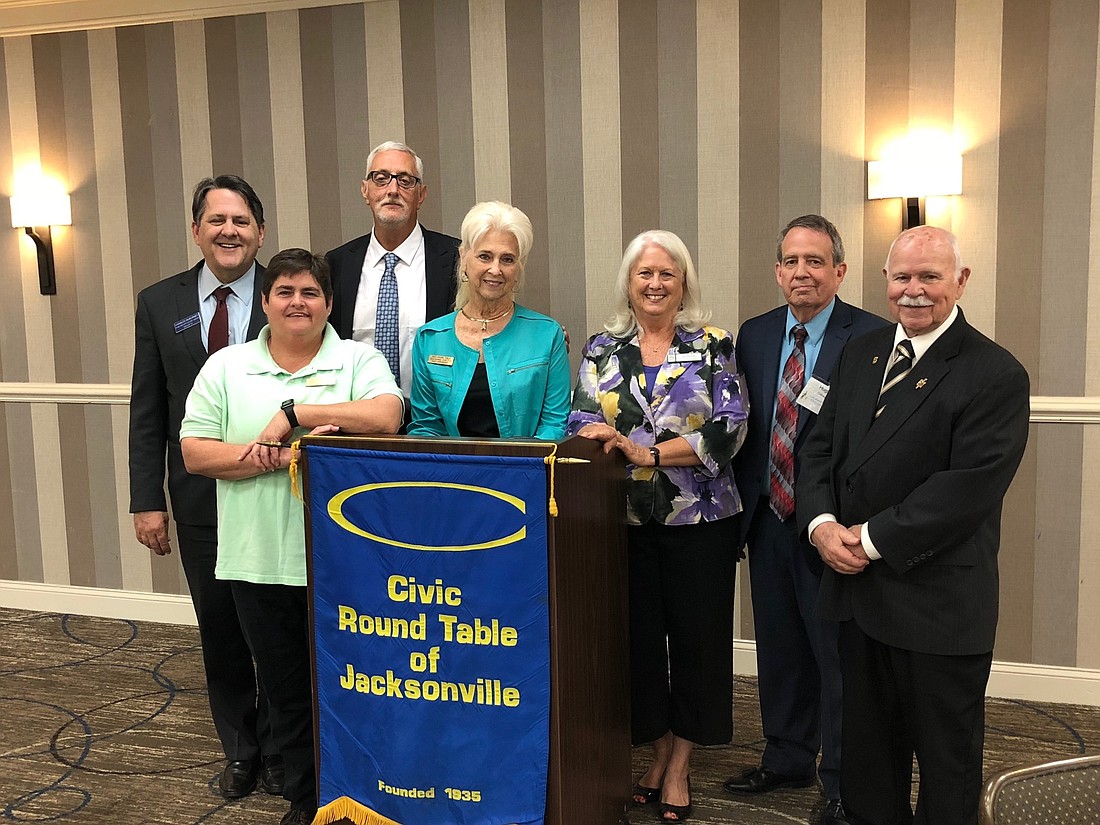 The latest and past presidents of the Civic Round Table of Jacksonville. From left: Charles McBurney; Mary James; the last president, Mark Brooks; Suzanne Catto; Gail Pender; Hugh Cotney; and Henry Moreland.