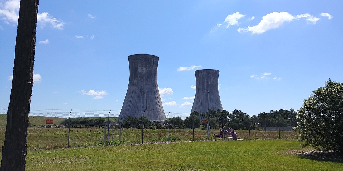 The cooling towers at the decommissioned JEA power plant at 11201 New Berlin Road.