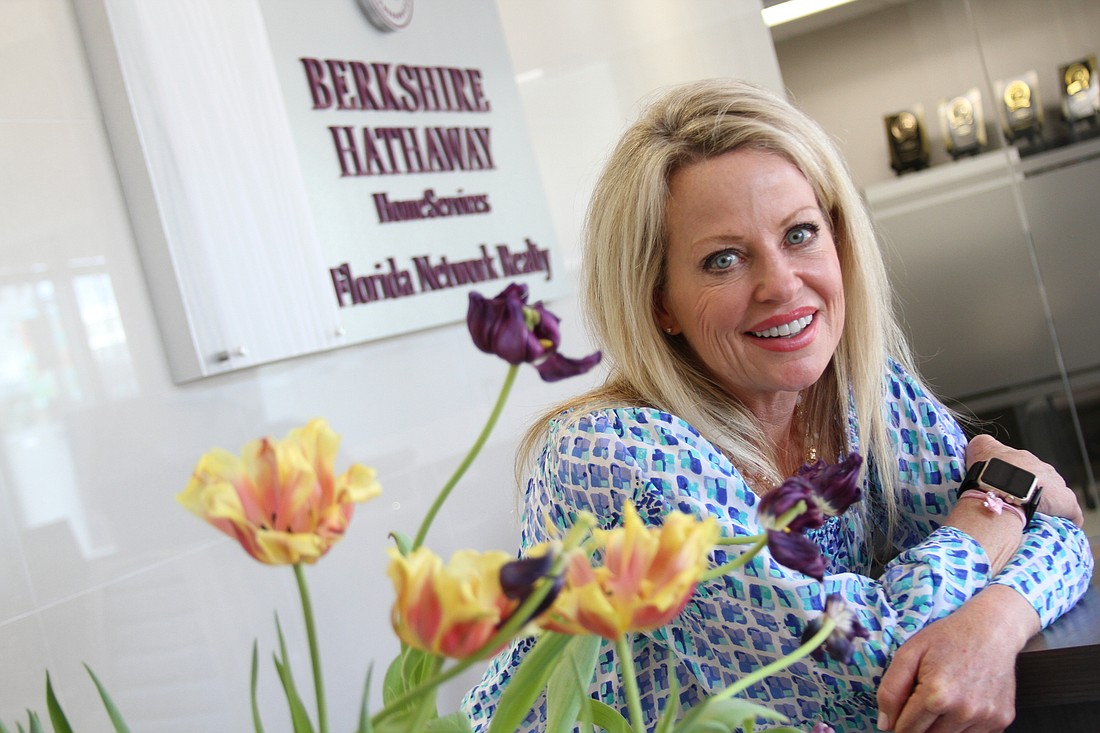 Robin Chapman at the Berkshire Hathaway Florida HomeServices Network Ponte Vedra/Nocatee office. As a commercial lighting executive, she helped design Nocatee Parkway.