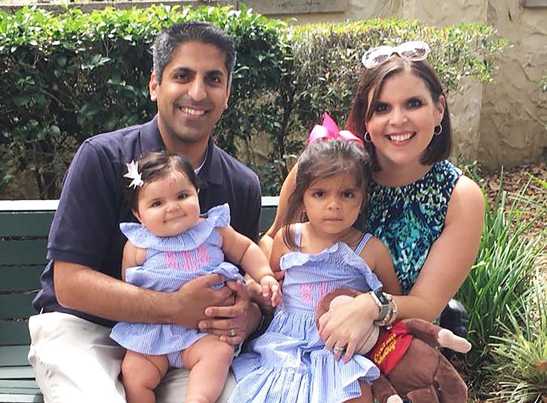 Lindsay L. Tygart with her husband, Fraz Ahmed, and daughters Silas Steele, 7 months, and Salem Grace, 3.