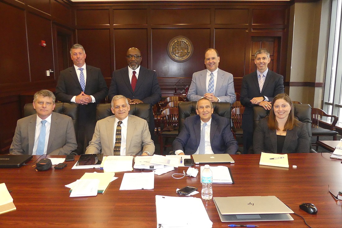 The Judicial Nominating Commission for the 4th Judicial Circuit: Back row, from left, Jacob Brown, Dexter Van Davis, Michael Abel and commission Chair Patrick Kilbane. Front row: Patrick Joyce, Chip Bachara, Ro