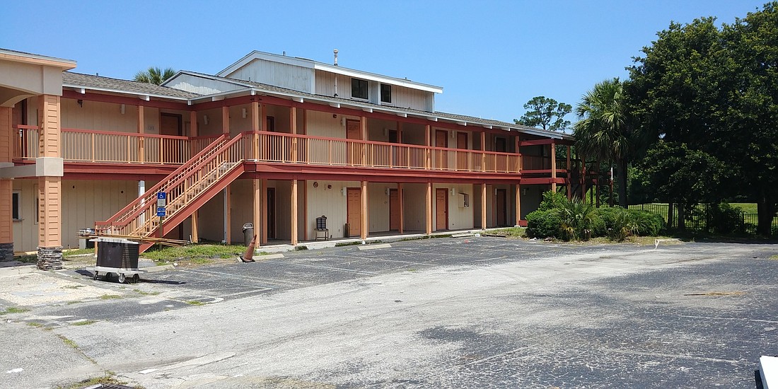 A development group is considering conversion of a former inn at 8050 Baymeadows Circle W. into studio and one-bedroom apartments.