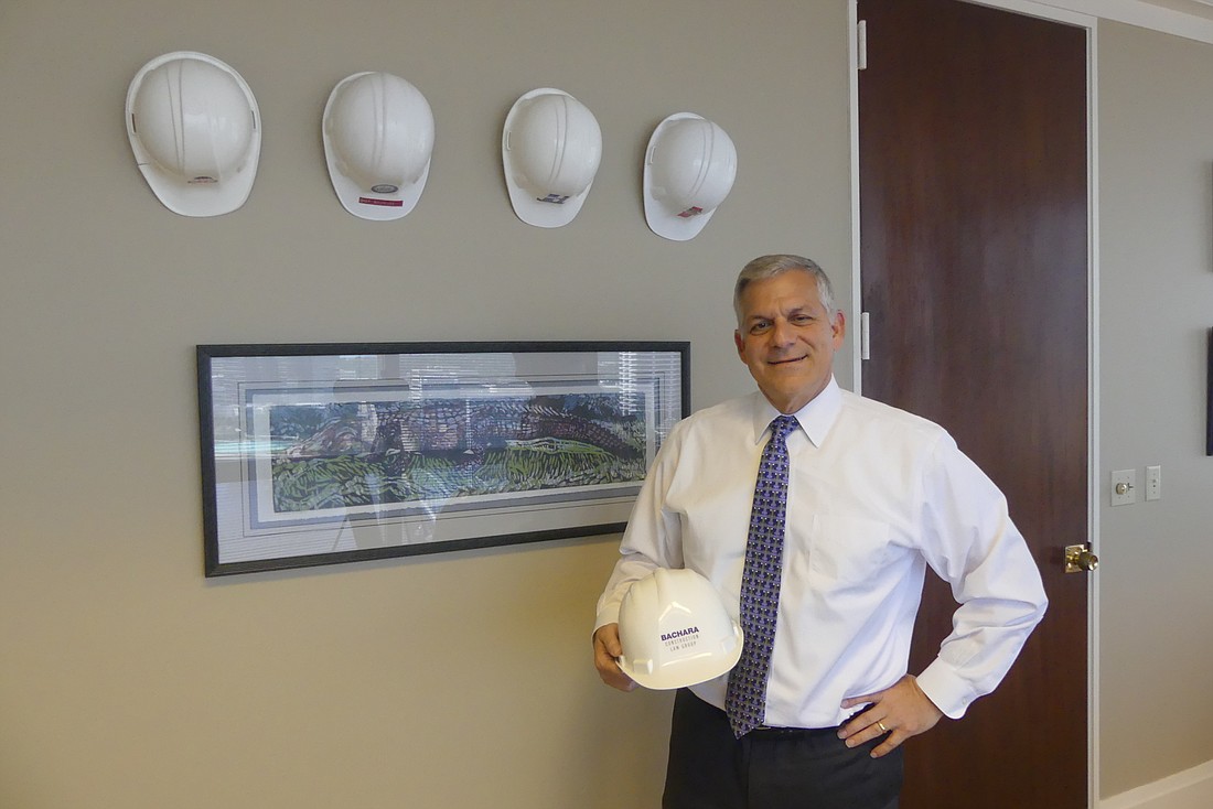 Chip Bachara, founding partner of Bachara Construction Law, in his office at Wells Fargo Center.