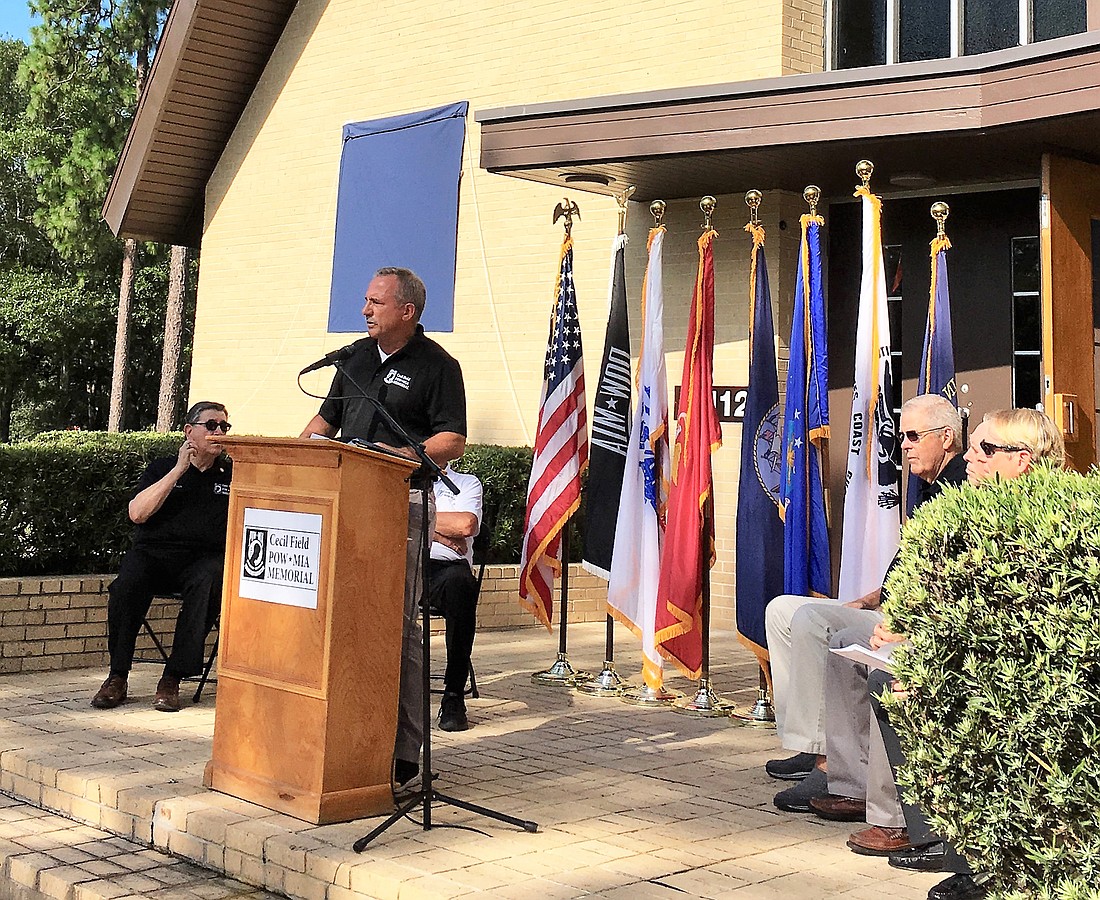 Albert â€œBuddyâ€ Harris, a retired Navy commander who has been actively pushing for a national POW-MIA memorial, spoke at Tuesday&#39;s dedication ceremony.