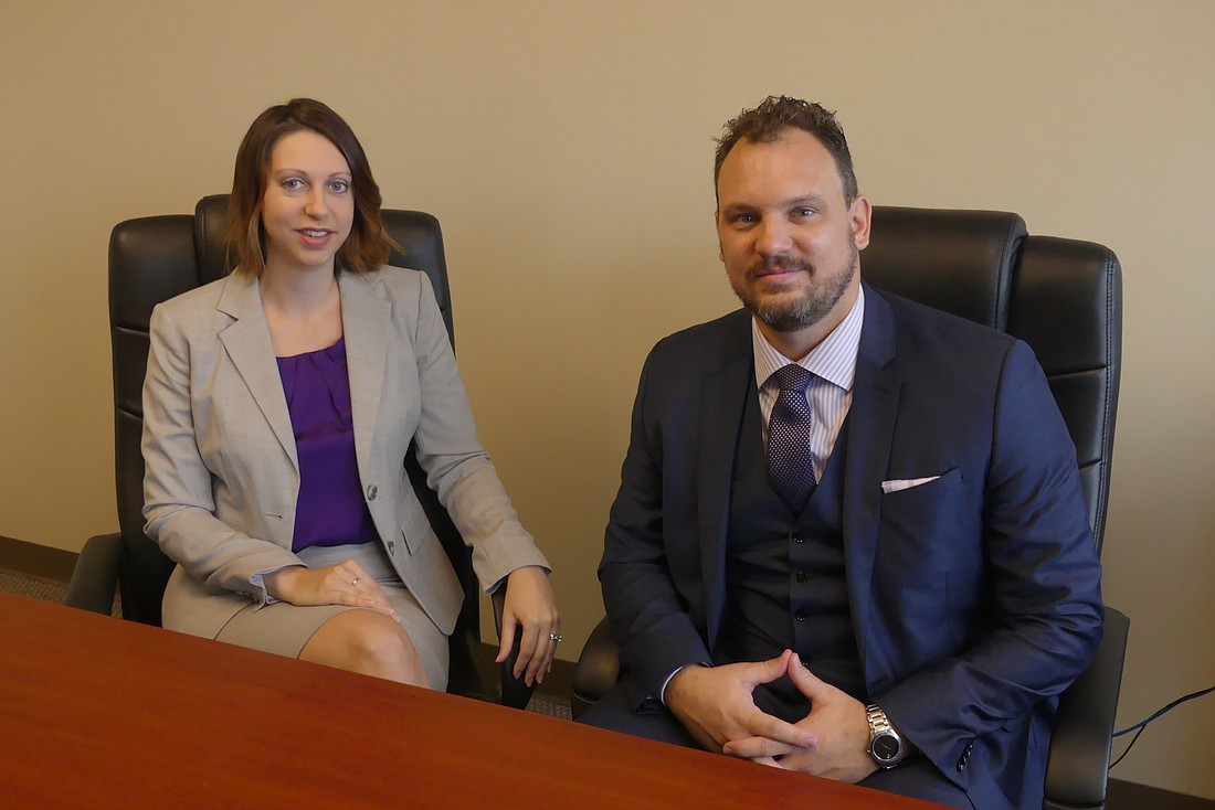 Kelly Karstaedt and Brandon Stanko have a two-person law practice that is focused on providing services to small businesses.