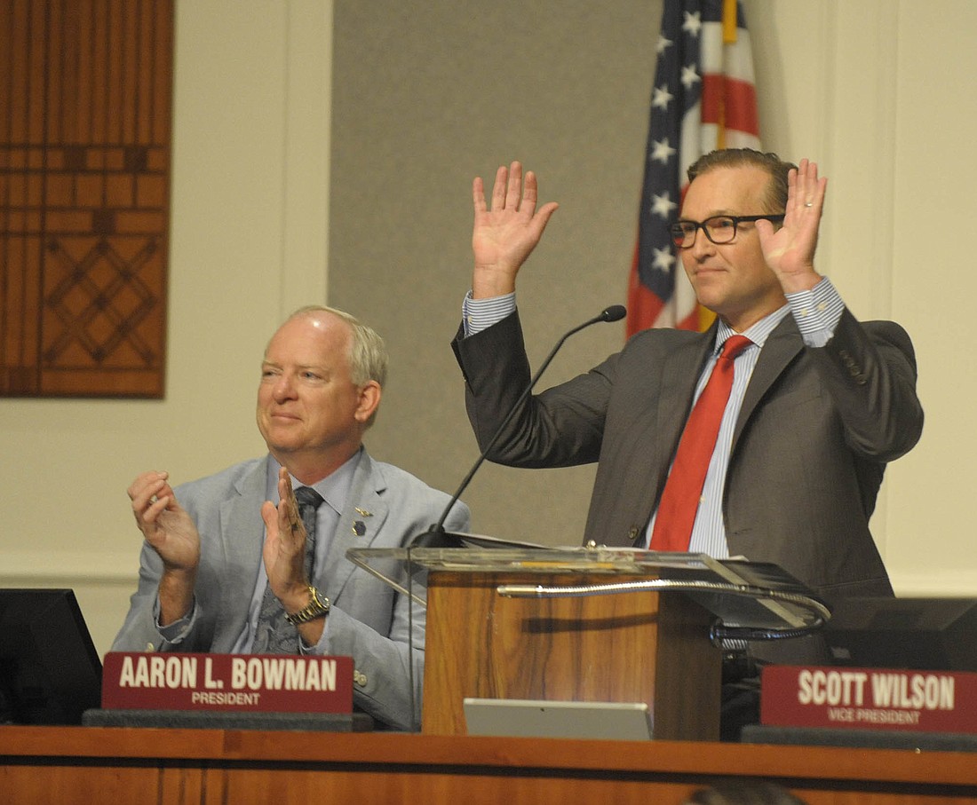 Mayor Lenny Curry acknowledges the audience as he prepares to introduce his 2018-19 city budget at City Hall on Monday. At left is City Council President Aaron Bowman. (Photos by Dede Smith)