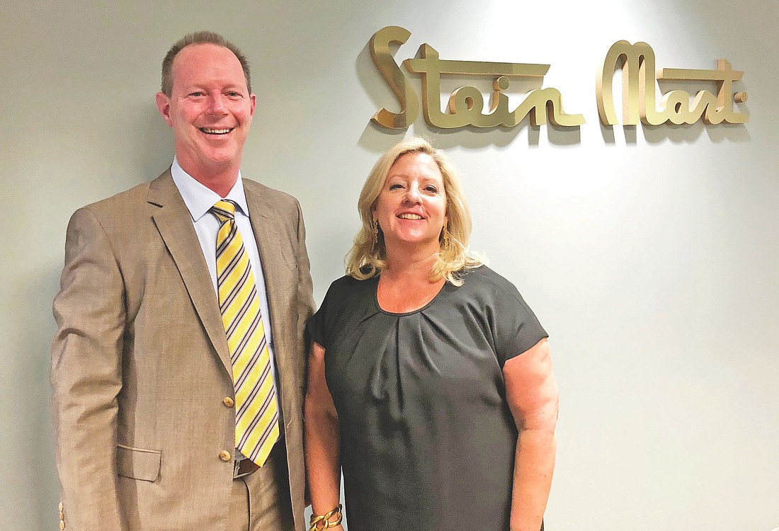 Stein Mart CEO Hunt Hawkins with President MaryAnne Morin.
