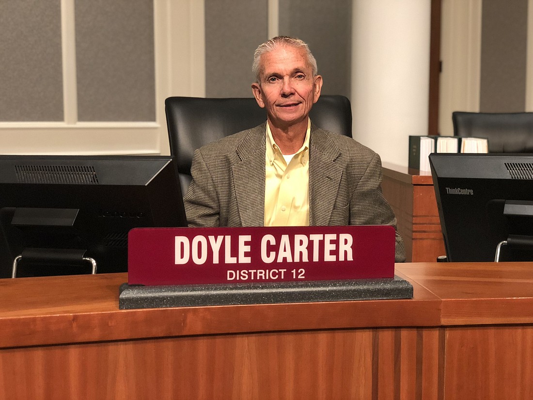 Doyle Carter attends his final meeting Wednesday as a City Council member. He resigned in June to run for Duval County Tax Collector.