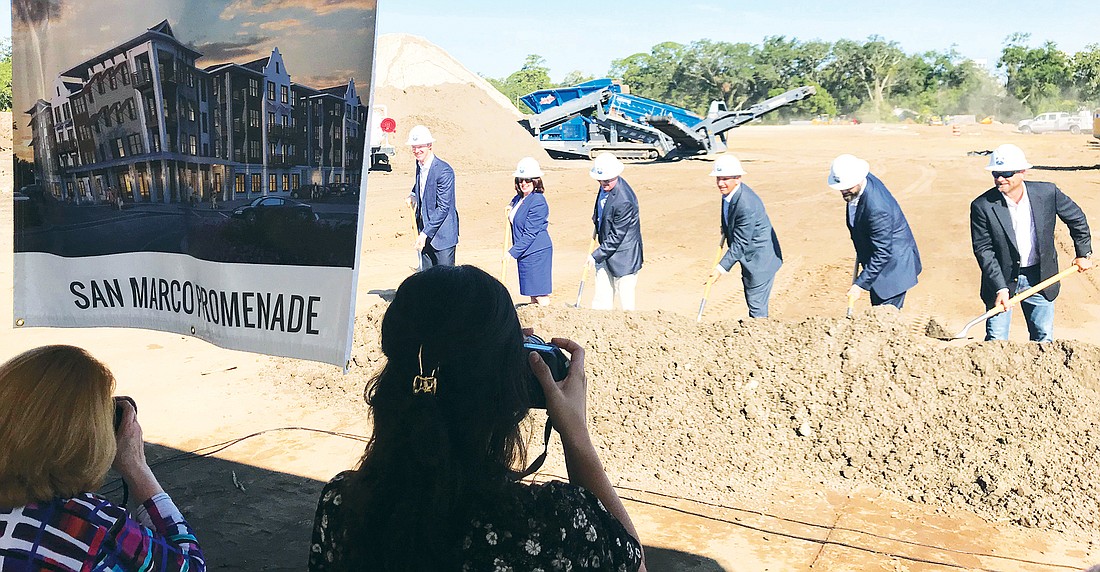 Developers, the builder and others, including City Council member Lori Boyer, broke ground Tuesday along Philips Highway for the San Marco Promenade apartments.