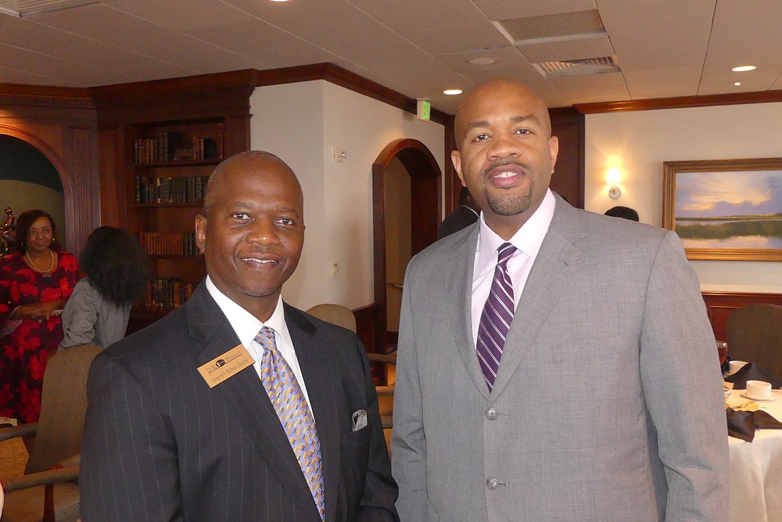 D.W. Perkins Bar Association President Gregory Redmon, left, and Zachary Faison, the new president and CEO of Edward Waters College.