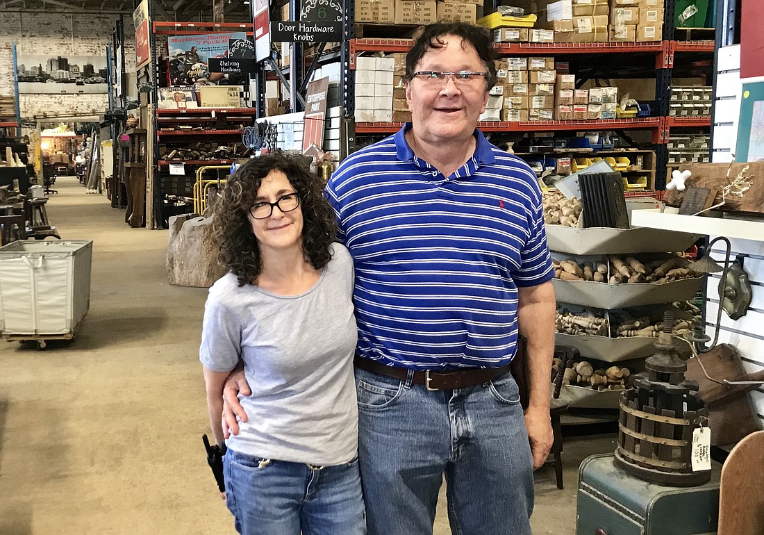 Michael and Annie Murphy, the owners of Eco Relics. Annie Murphy is vice president of the Rail Yard District Business Council, a group working to improve the neighborhood.
