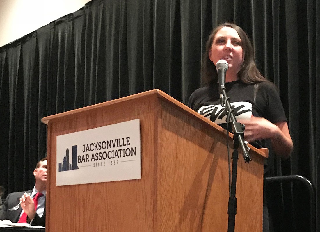 Robert E. Lee High School teacher Amy Donofrio speaks at the Jacksonville Bar Association member luncheon Sept. 12 at the Prime F. Osborn III Convention Center.