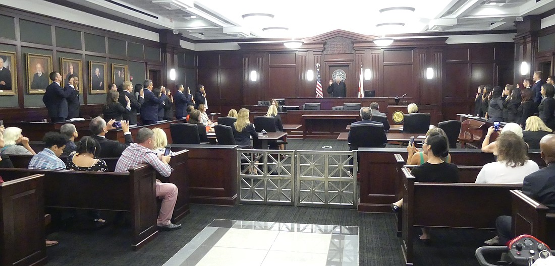Chief Judge Mark Mahon swore in 31 attorneys Sept. 20 at the Duval County Courthouse.