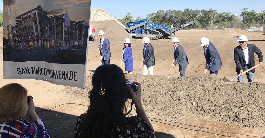 Developers, the builder and others, including City Council member Lori Boyer, participated in a groundbreaking ceremony along Philips Highway for the San Marco Promenade apartments.
