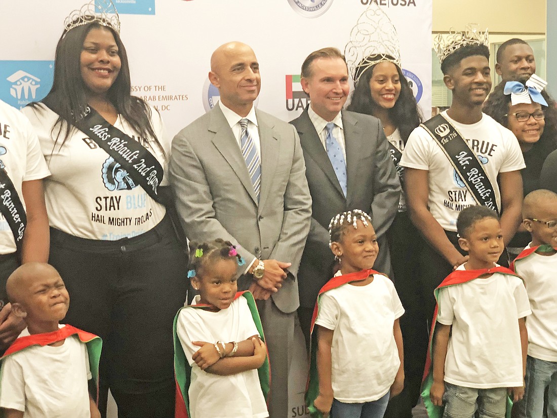 UAE Ambassador to the U.S. Yousef Al Otaiba, second from left, and Jacksonville Mayor Lenny Curry announced a $2.775 million grant for hurricane recovery efforts at the A. Philip Randolph Academies of Technology on Monday.