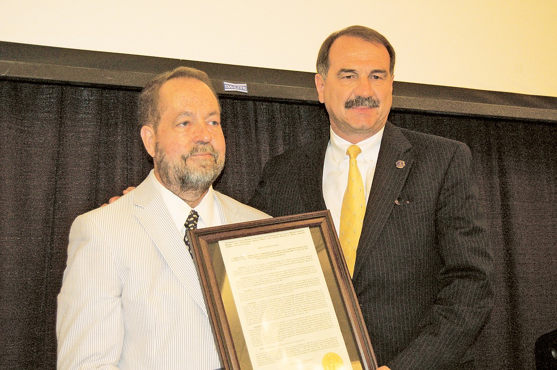 Bill Brinton, left, with City Council member John Crescimbeni on May 17, 2017, when Brinton was honored by Scenic Jacksonville for his service to the community.  Brinton died in 2017.