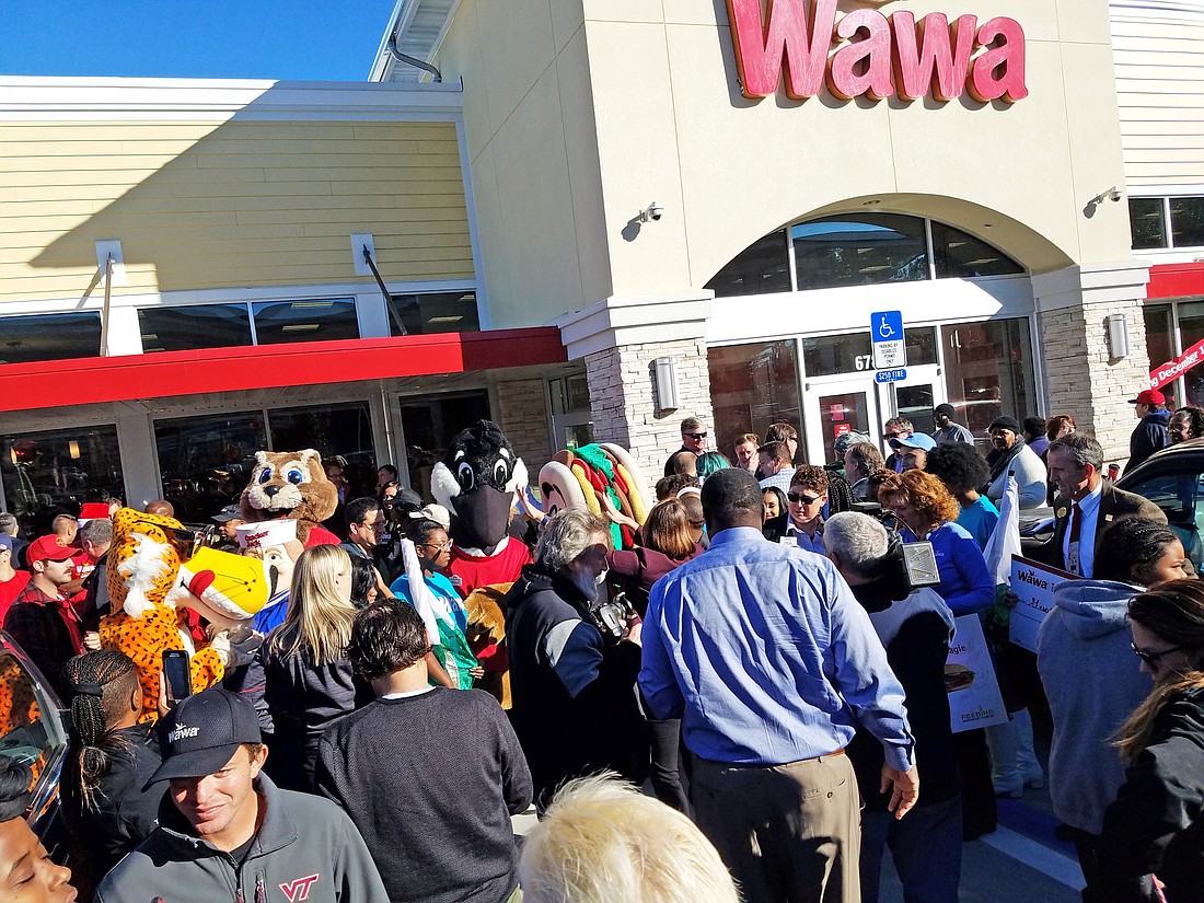 Crowds pack the parking lot for the grand opening of the first Wawa in Jacksonville at 6787 Wilson Blvd. on Dec. 14, 2018.