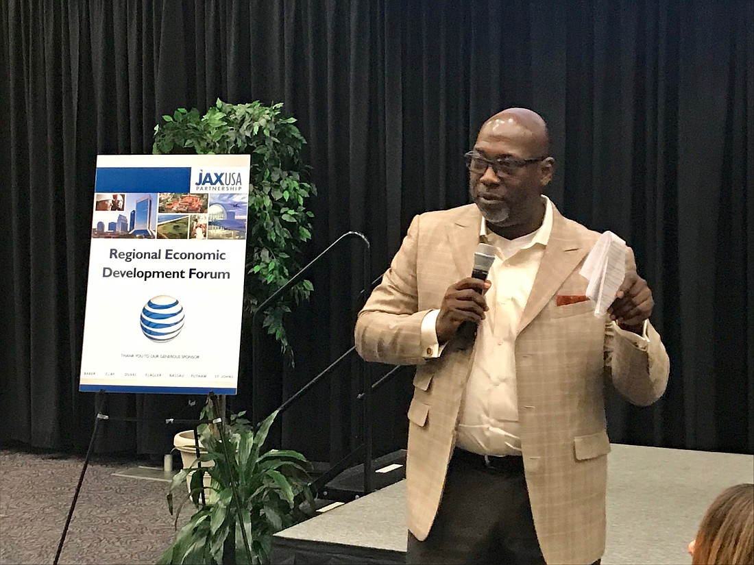 JAXUSA President Aundra Wallace talks about the Elevate Northeast Florida report at a September forum. He met with St. Johns County Administrator Mike Wanchick Friday to discuss the same thing.