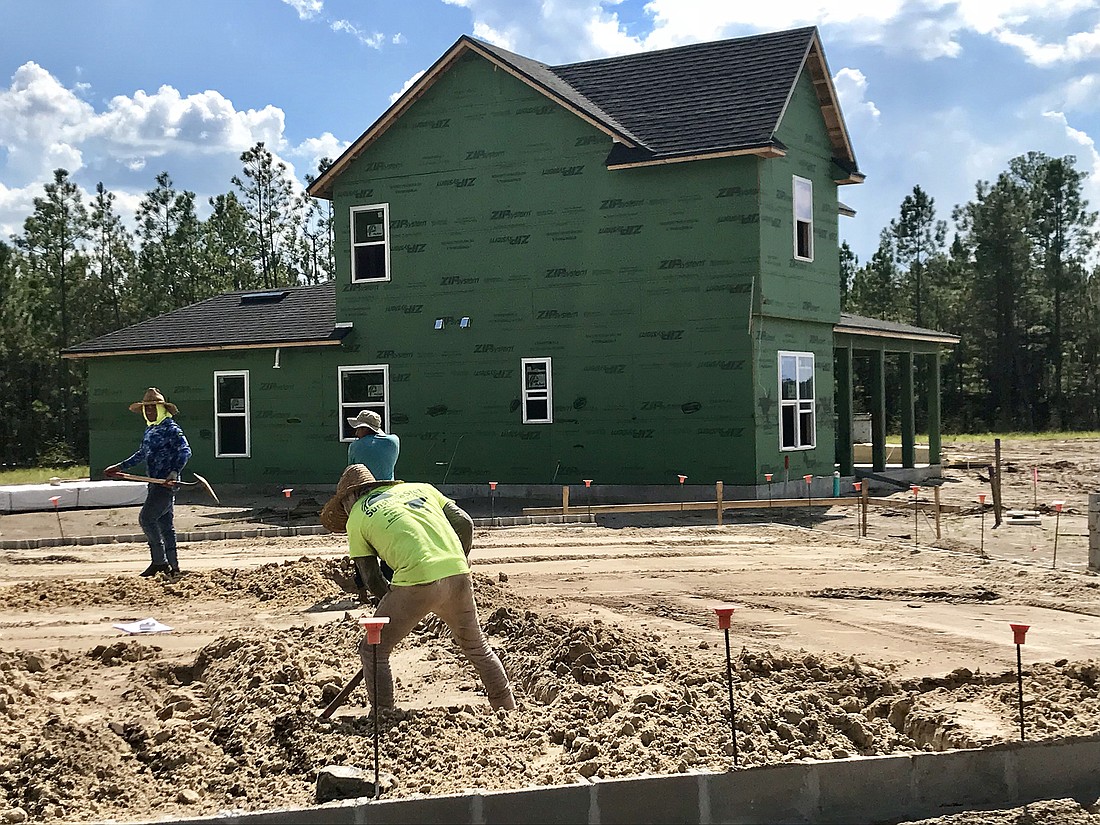 Northeast Florida homebuilders are having a difficult time finding qualified, available trades professionals to build projects in the region, resulting in construction taking weeks or even months. Photo by Jay Schlichter