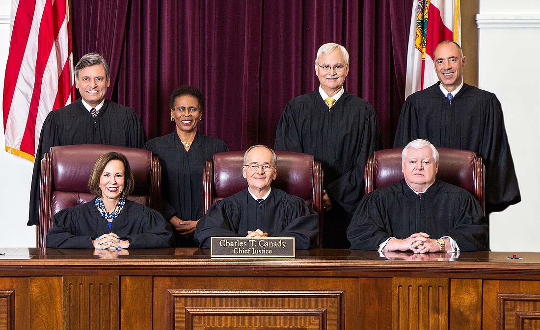 The Supreme Court of Florida, front row, Justice Barbara Pariente, Chief Justice Charles Canady and Justice R. Fred Lewis. Back row: Justice Jorge Labarga, Justice Peggy Quince, Justice Ricky Polston and Justice Alan Lawson.