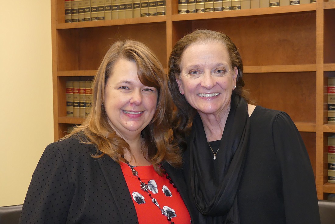 Attorney Melissa Davenport, left, Jacksonville Area Legal Aidâ€™s new director of pro bono, with Kathy Para, who is retiring after leading the organizationâ€™s volunteer attorney program since 2009.