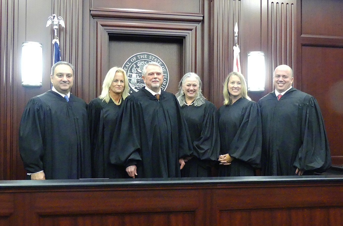 From left, Duval County Judges Michael Bateh and Kimberly Sadler, 4th Circuit Chief Judge Mark Mahon, and Circuit Judges Maureen Horkan, Katie Dearing and Collins Cooper.