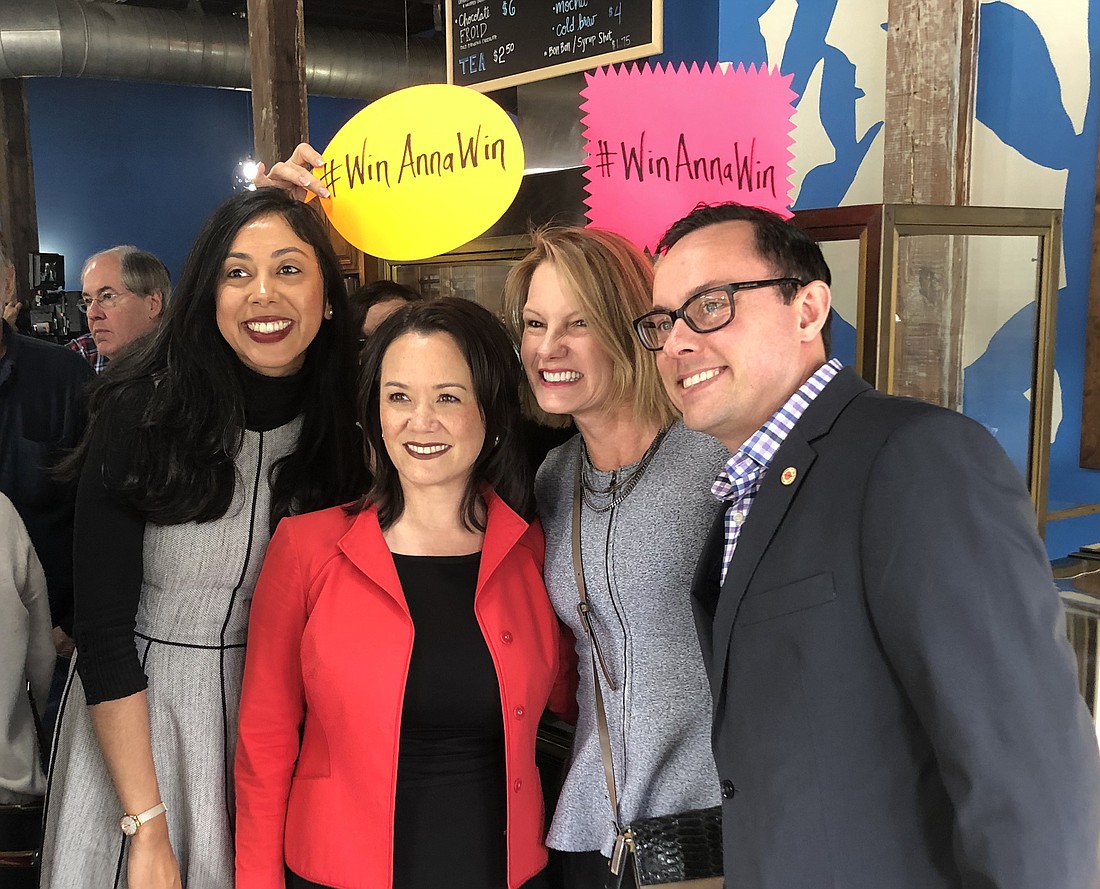 City Council member Anna Lopez Brosche, second from left, with supporters at the Bleu Chocolat CafÃ© in Springfield after announcing she is running for mayor.