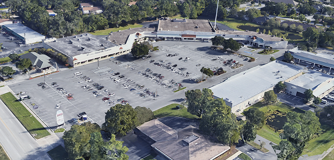 The Dupont Station shopping center sold for $3.9 million, 56 percent more than the $2.5 million it sold for in 2011. (Google)