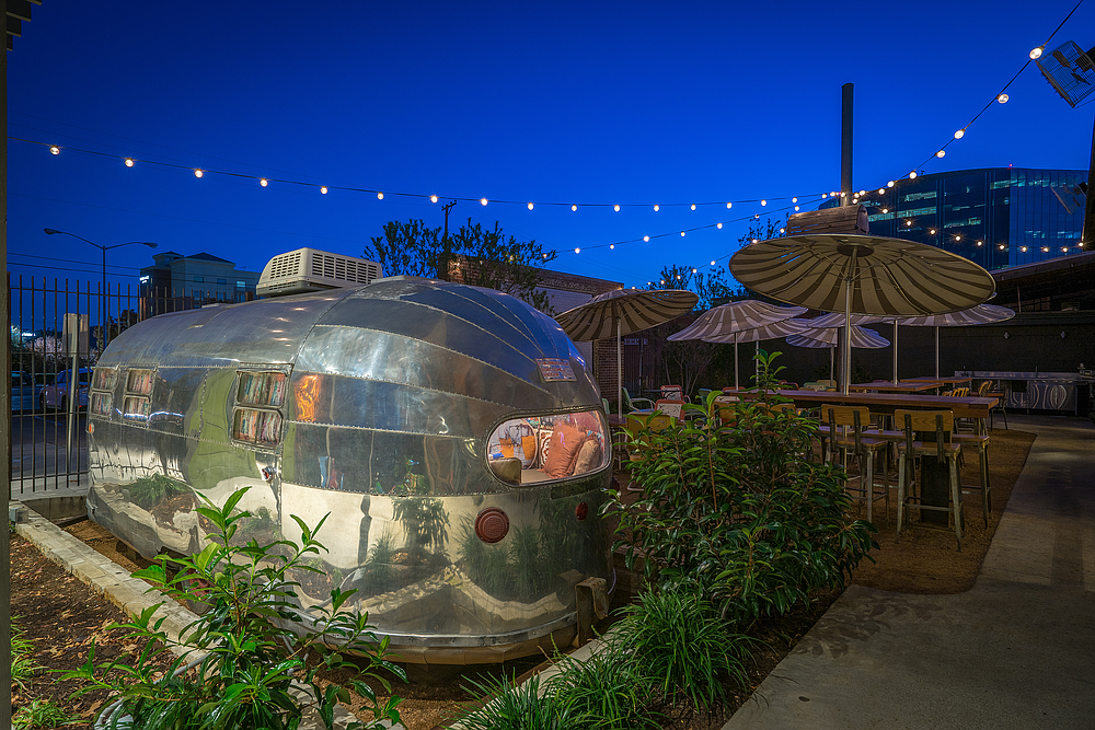 The Ida Claire in Dallas features a decorated Airstream trailer that parties of 12 or less can book. The trailer is shown on the renderings for the Jacksonville restaurant.
