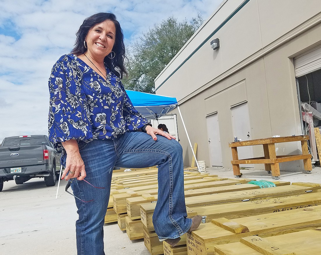Tina Meskel, founder of Meskel & Associates Engineering, stands outside her offices at 8936 Western Way in the Southside.  (Photo by Drew Dixon)