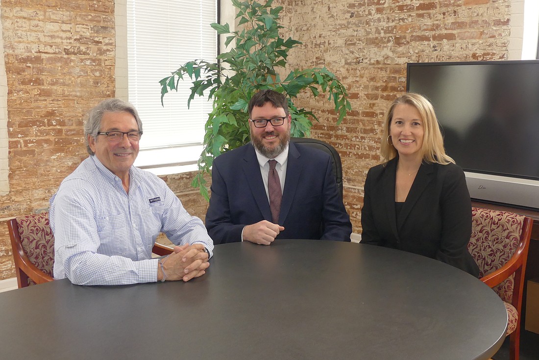 From left, former Jacksonville Bar Association Executive Director Jim Bailey, his successor, Craig Shoup, and Circuit Judge Katie Dearing, president of the association.
