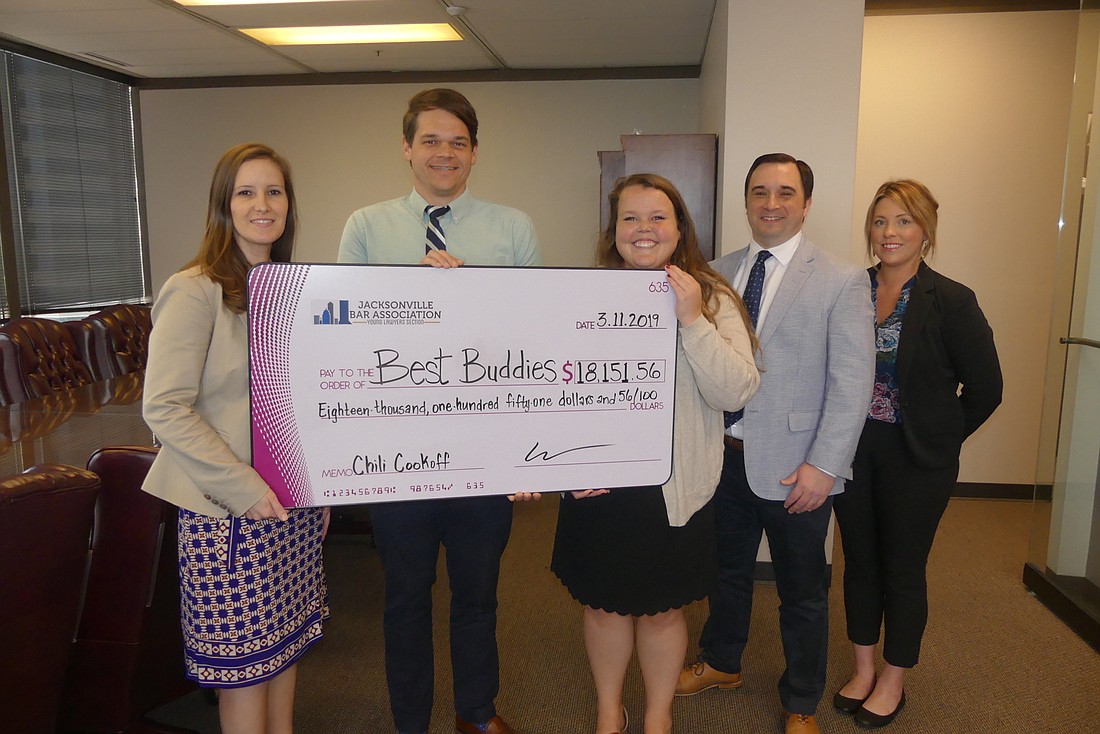 Jacksonville Bar Association Young Lawyers Section 2019 Charity Chili Cook-off Committee donate the cook-off proceeds to Best Buddies Jacksonville.