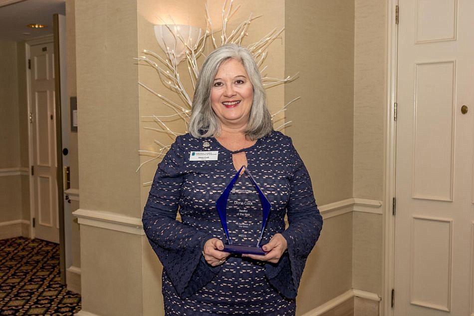Photo courtesy of NEFAR Diane Cook was named the 2018 Realtor of the Year at the Northeast Florida Association of Realtorsâ€™ â€œSharing the Journeyâ€ installation of officers and awards gala.