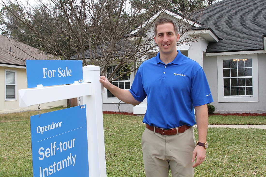 Opendoor General Manager for Jacksonville Greg Hiltz  shows the home the company has for sale at 12051 Livery Drive in Jacksonville.
