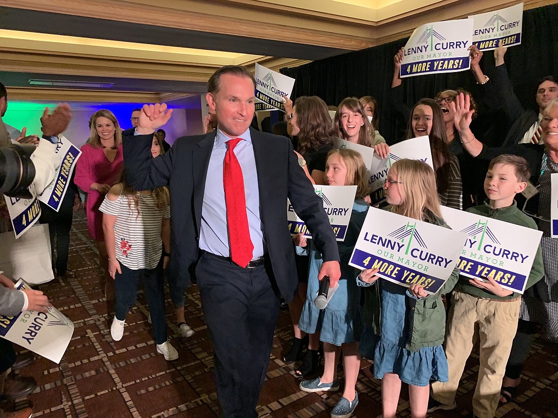Jacksonville Mayor Lenny Curry is surrounded by supporters at his election celebration Tuesday at the Hyatt Regency Jacksonville Riverfront hotel. Curry was re-elected with 58 percent of the vote.
