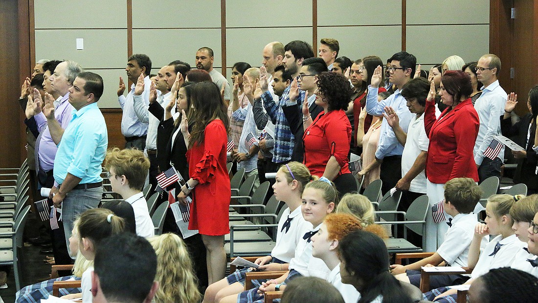 On April 18, 50 people from 30 countries became U.S. citizens at the annual Law Week Naturalization Ceremony at the Bryan Simpson U.S. Courthouse. (Photo by Ed Fernandez for the Federal Bench & Bar Fund)