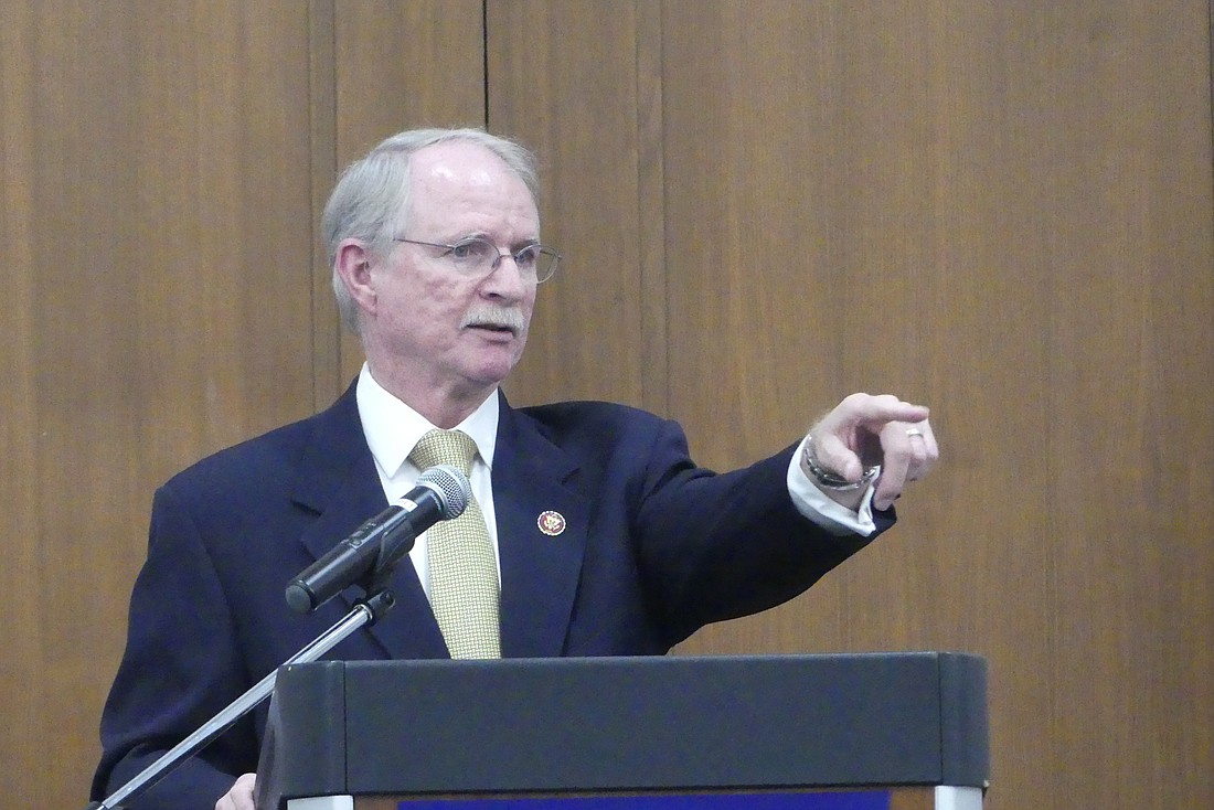 U.S. Rep. John Rutherford speaks to the Jacksonville Lawyers Chapter of the Federalist Society on Monday at the Main Library.