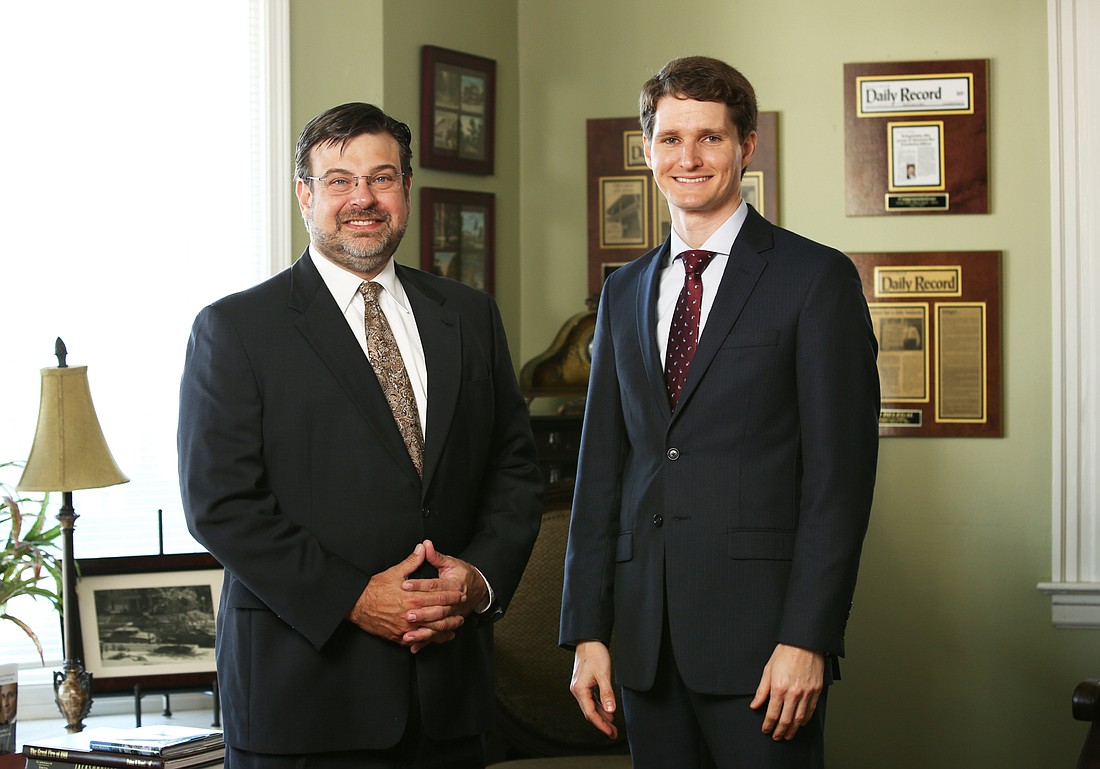 Tad Delegal, left, and James Poindexter are law partners at the newly formed Delegal & Poindexter.
