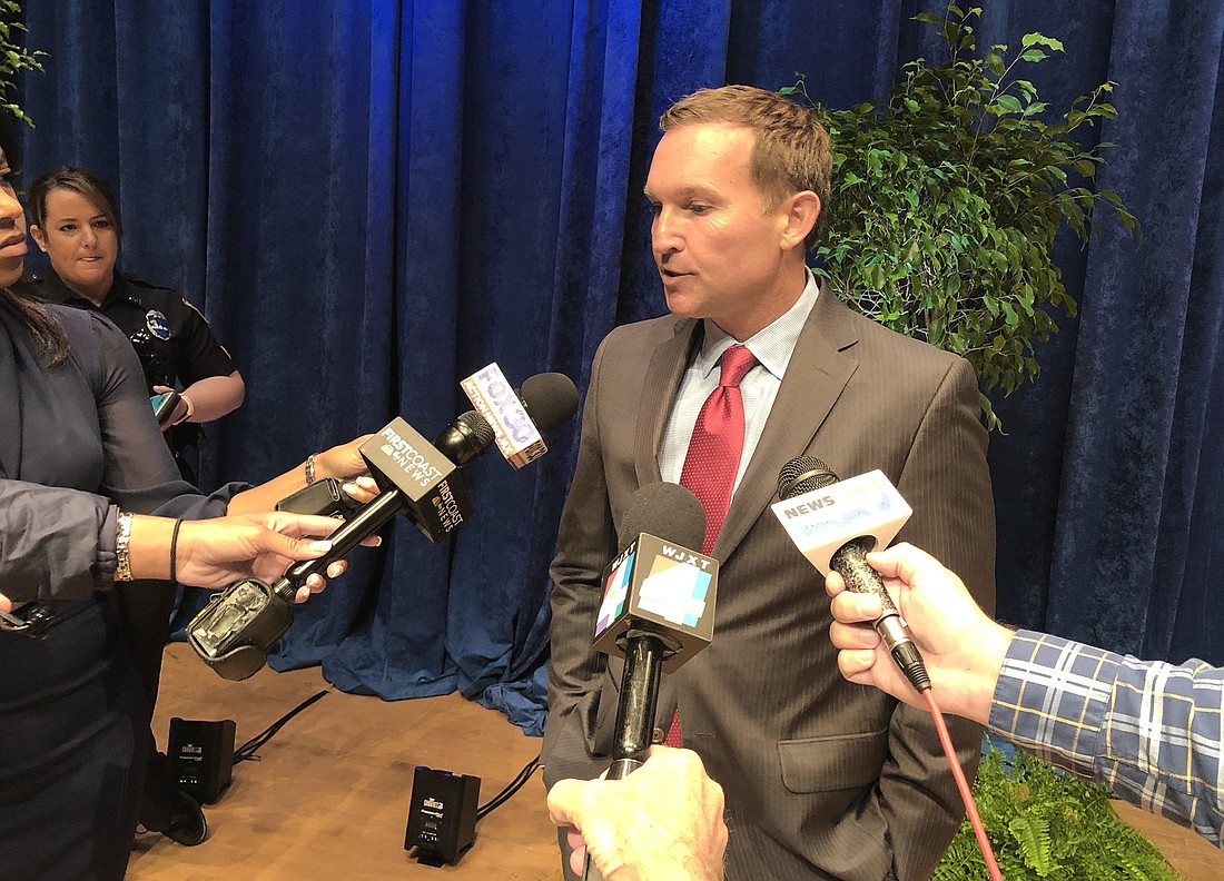 Second-term Jacksonville Mayor Lenny Curry speaks to reporters Monday at the Times-Union Center for the Performing Arts after his inaugural address.