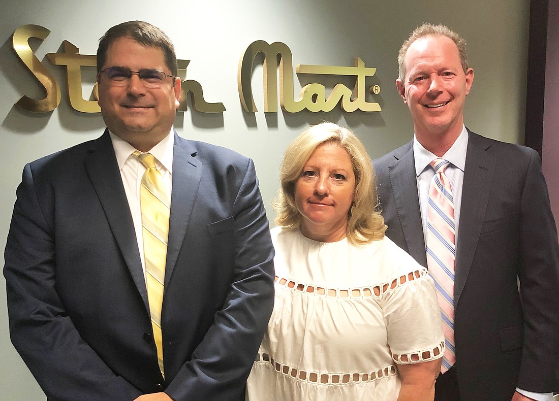 Stein Mart Inc. CFO James Brown, President MaryAnne Morin and CEO Hunt Hawkins.